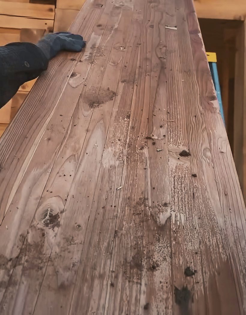 Close-up of a raw log being set
